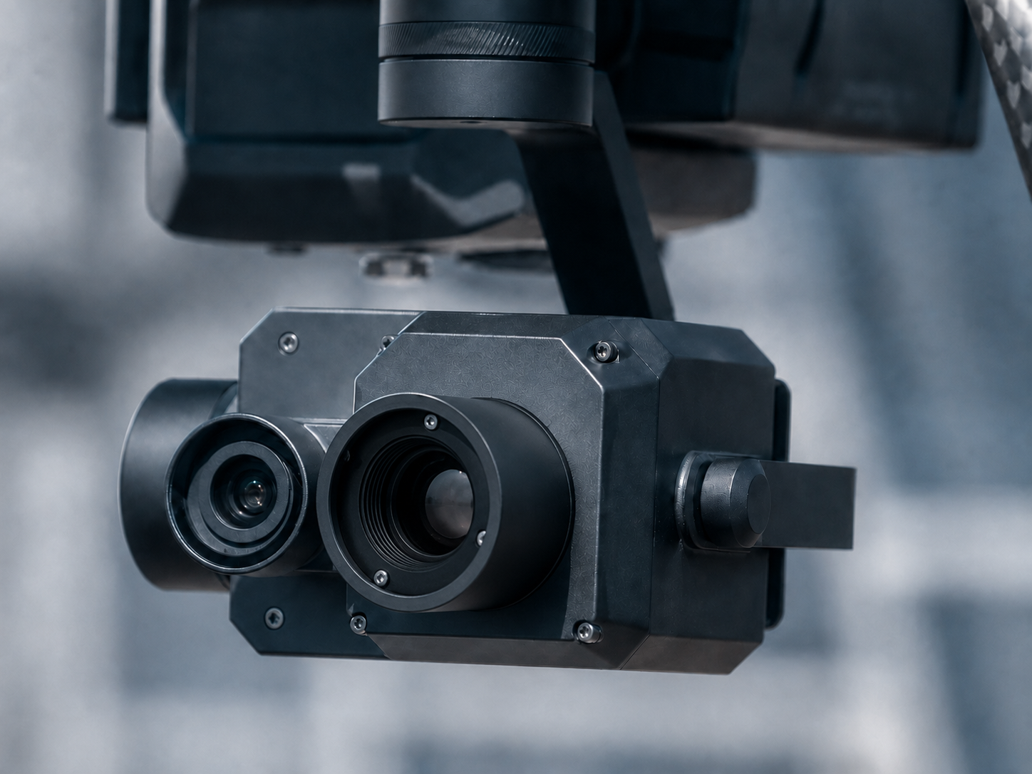Compact thermal and visible-light camera payload integrated into a platform gimbal